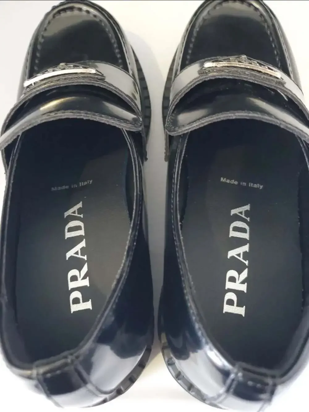 Prada Spazzolato Brushed Leather Loafers with Metal Triangle Logo